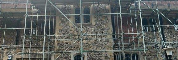 Full-perimeter scaffold to a historic flint and brick building